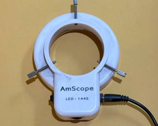 LED light component of the AmScope stereo zoom microscope on an articulating arm stand