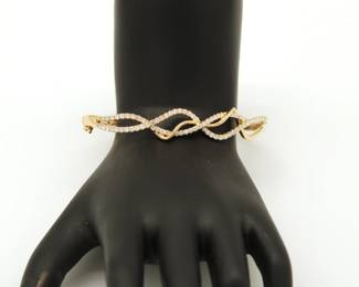 14k yellow gold and diamond hinged bangle 