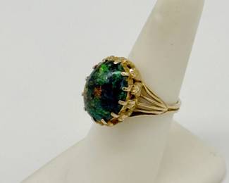 Another view of the 18k yellow gold and black opal ring