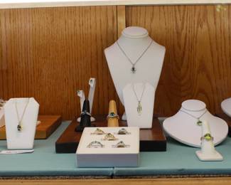 Emeralds and gold and other green gemstones - rings, pendant necklaces, earrings