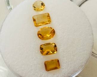 Closeup of loose citrine gemstones set