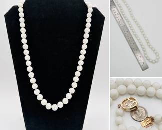 A 14k yellow gold and white mutton fat jade beaded necklace