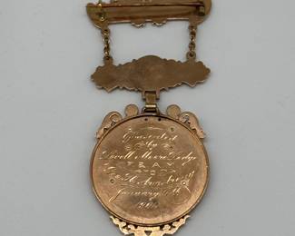 Reverse view of the gold-filled 1904 Muskegon Masonic Past Master badge pin featuring a compass, square, and quadrant design, in original leather presentation box.  Inscribed on the back with "Presented by Lovell Moore Lodge to Geo. H. Armstrong January 4th 1904"