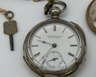 Antique pocket watch with chain and key, from August Krautheim, Muskegon Michigan