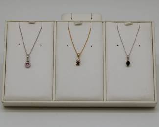 Beautiful new jewelry! Gold, sapphire and diamond pendant necklaces