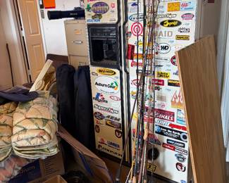Several vintage fishing rods, including deep sea fishing