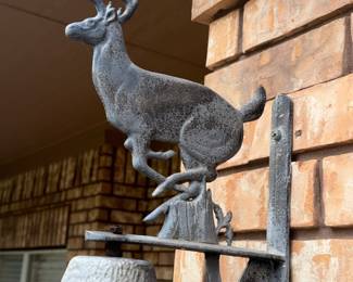 Vintage cast iron bell with deer ornament 