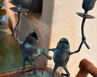 Whimsical bronze frogs dancing on Lilypad candle stick holder