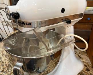 The KitchenAid Classic Series 4.5 Quart Tilt-Head Stand Mixer  is a durable, all-metal, 275-watt mixer designed for home bakers, featuring a 4.5-quart stainless steel bowl, 10 speeds, and a tilt-head design for easy ingredient addition