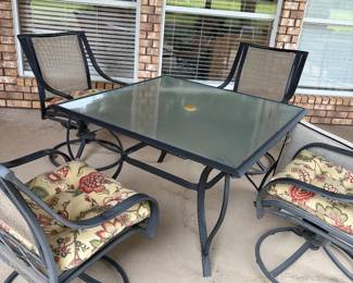 Patio table with tempered glass and four rocking chairs by Martha Stewart