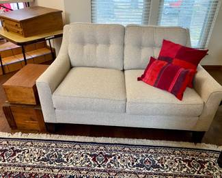 Lovely living room, so many nice pieces of furniture all in pristine condition