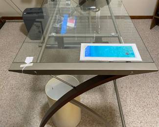 sleek desk, wood accents, glass and metal with curved side piece 