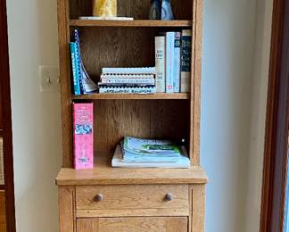 slender oak bookshelf or display shelf