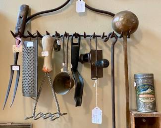 we have an entire wall of vintage kitchen tools, art and display pieces, it's really a work of art