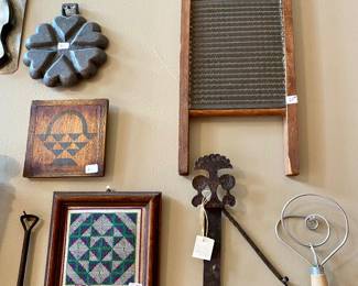 we have an entire wall of vintage kitchen tools, art and display pieces, it's really a work of art