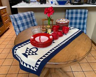 charming round farm table with two upholstered chairs 