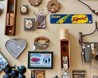 we have an entire wall of vintage kitchen tools, art and display pieces, it's really a work of art