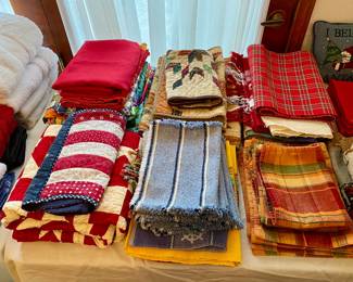 many nice clean and colorful linens