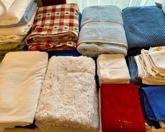 many nice clean and colorful linens