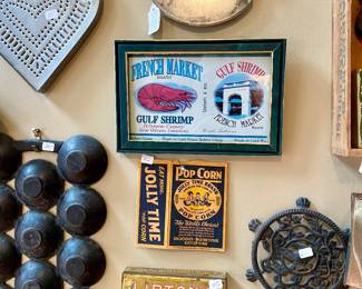 we have an entire wall of vintage kitchen tools, art and display pieces, it's really a work of art