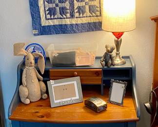 charming blue quilt and blue accent desk 