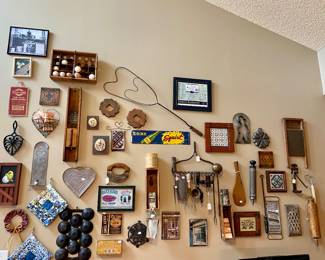 we have an entire wall of vintage kitchen tools, art and display pieces, it's really a work of art