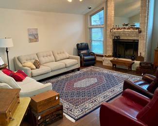 Lovely living room, so many nice pieces of furniture all in pristine condition 