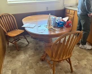 . . . oak dining room table and chairs