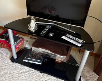 . . . flat-screen TV and TV stand