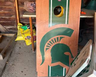 . . . U of M/Spartan cornhole game