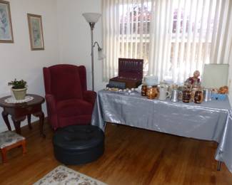 Bric-A-Brac, Recliner, Rolling Ottoman. Side Table, Floor Lamp