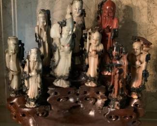 Hand carved figurines on stand