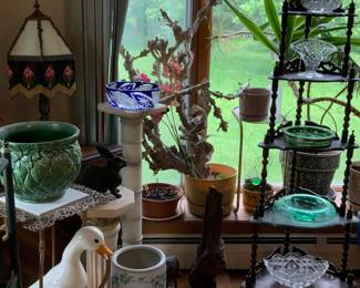 Assortment of pedestals, etagere, pottery, lighting and live plants that need some TLC