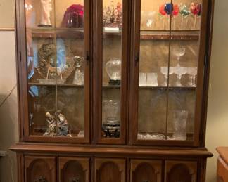 Large, illuminated china cabinet (contents not included). Plenty of storage space.