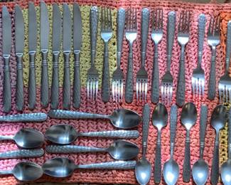 Stainless steel flat ware. Service for eight.