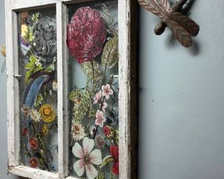 Vintage botanical window art piece featuring floral and bird designs