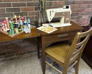 AI Overview                  This is a vintage Singer Touch & Sew Zig Zag model 758 sewing machine.