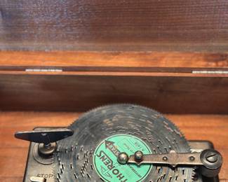 The "Liebermann Trunk Co. Dealers" label indicates this was sold by Liebermann’s, a prominent Lansing, Michigan , vintage Thorens AD30 music box, a popular Swiss-made disc-playing mechanism typically dating from the 1940s 