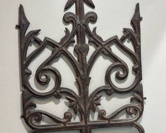 Vintage cast iron wall decor with hook