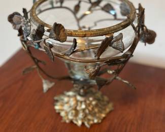 Vintage brass floral stand with a cut glass insert used as a centerpiece  