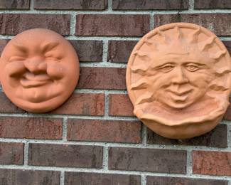 Terracotta sun face wall plaques