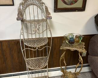 Vintage wrought iron tiered plant stand  featuring intricate scrollwork , antique brass plant stand 
