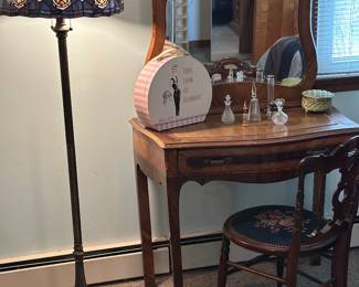 Vanity table,  hand-blown glass perfume bottles and decanters with daubers