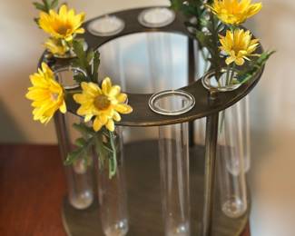 Metal and glass circular test tube vase, often referred to as a "Rotunda" style flower arranger 