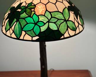 Tiffany Studios "Woodbine" style  leaded glass and bronze table lamp 
