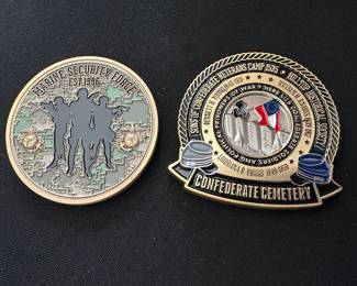 Two military-style challenge coins