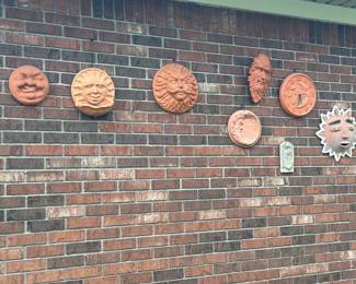 Vintage terracotta celestial moon and stars wall plaque.