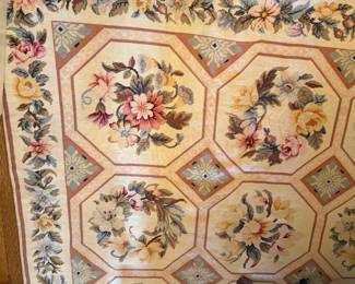 $600. Floral pattern antique rug. 8’10” by 11’9”.