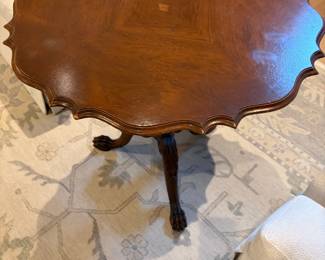Antique round with scalloped edge flip top table. 27 inch diameter by 25.5 inches high.