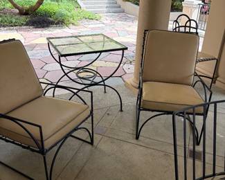 Pair of lounge chairs shown with a table sold separately. Chairs are 22.25 inches wide by 24 inches deep by 33 inches high